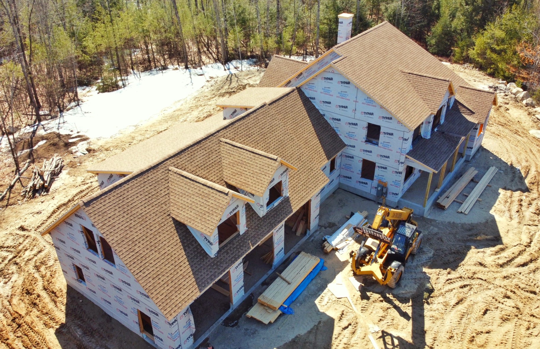 Finished exterior with multi-gable roofline