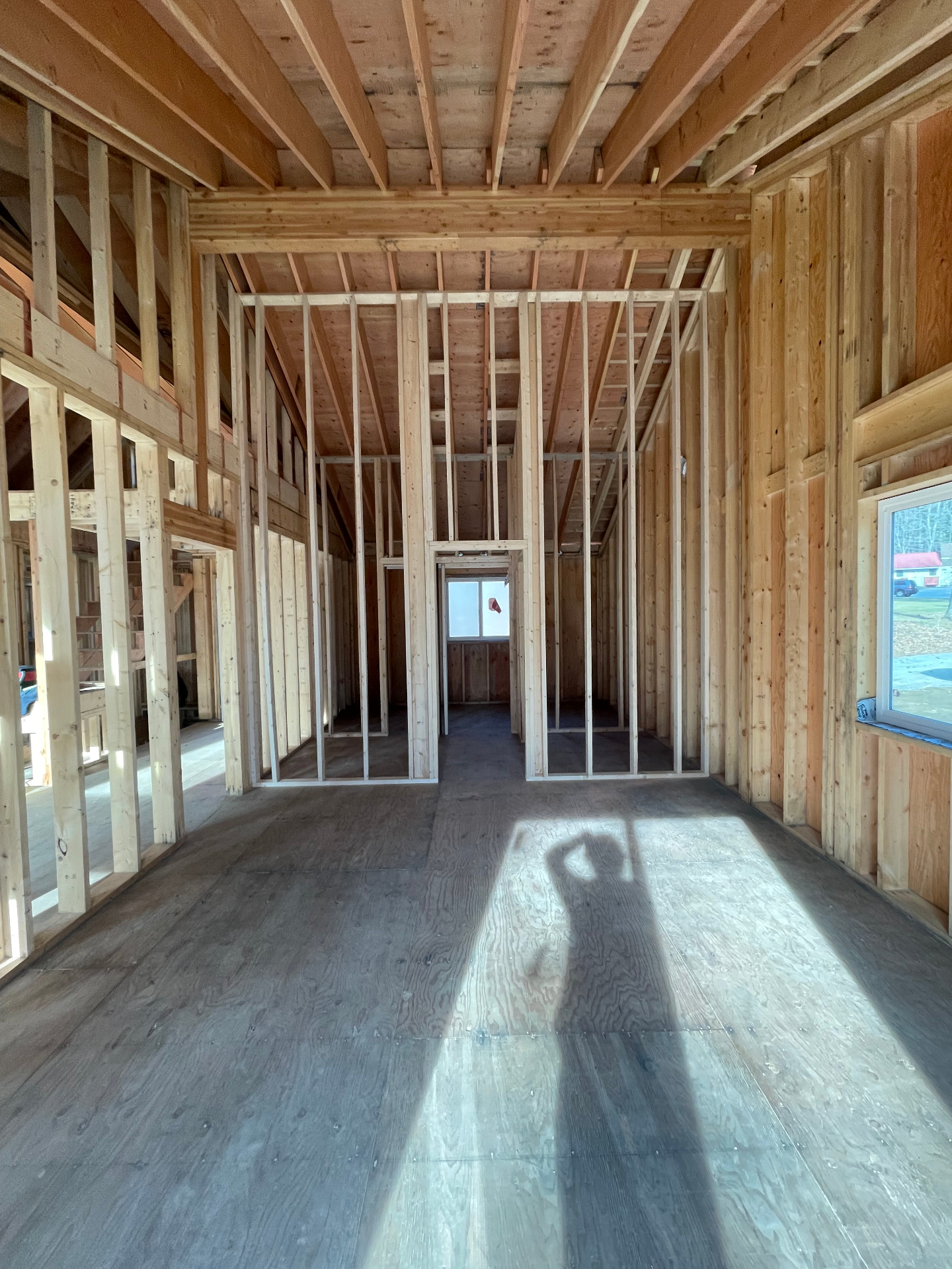 Second-floor framing with interior partition walls and plywood subfloor