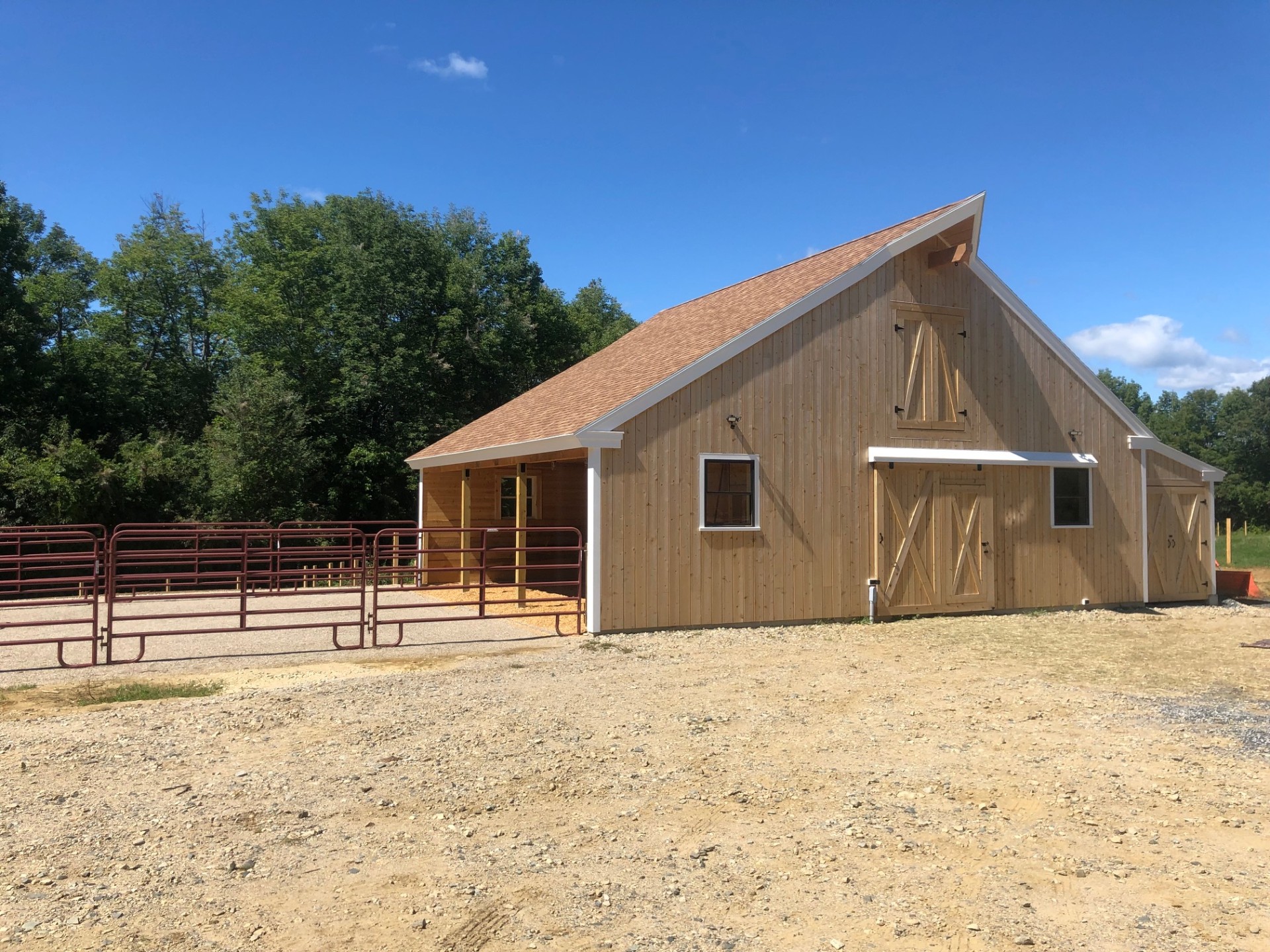 Horse stable exterior with paddock