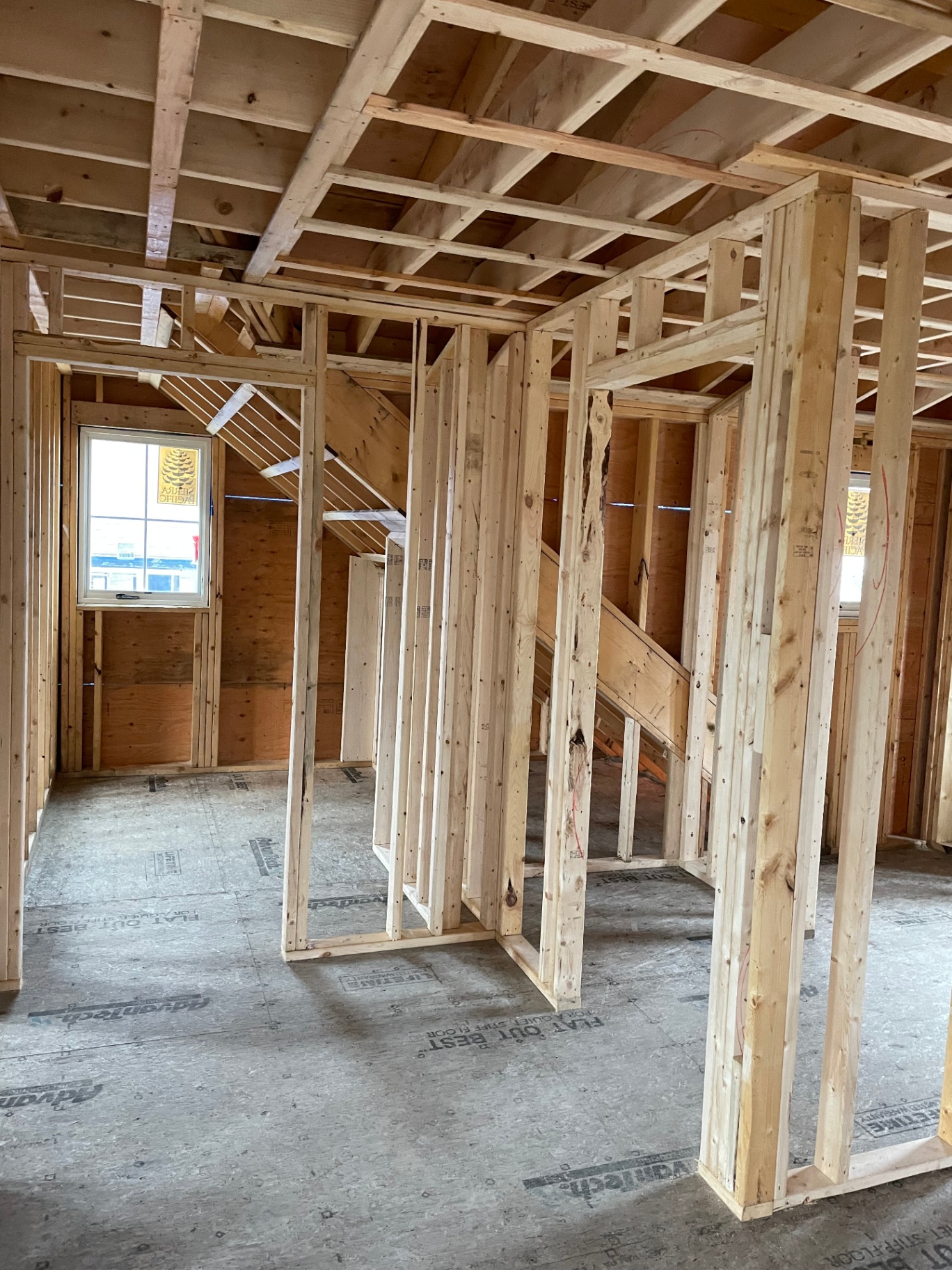 Second-floor interior framing with partition walls and dormer window rough-openings