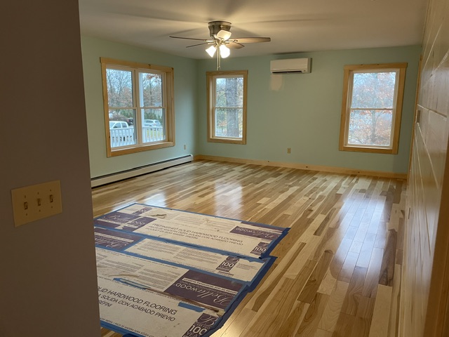 Open living space with hardwood floors