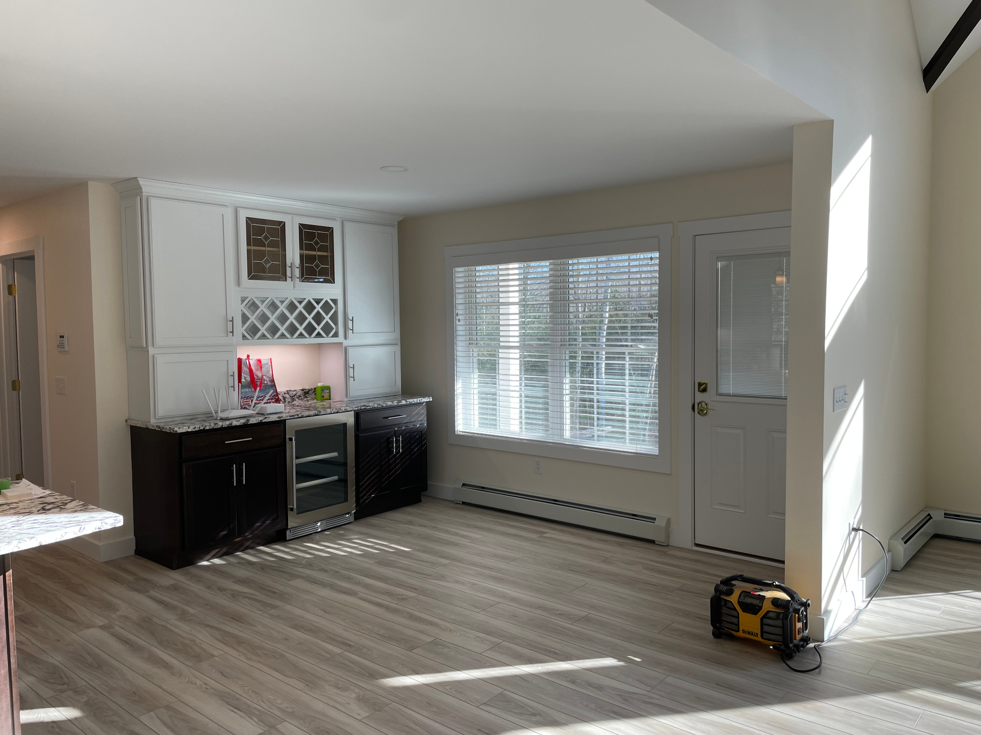 Wet bar in context with great-room flooring
